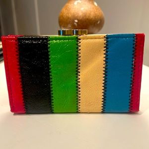 Vintage striped wallet. Coin purse and two interior red patent pockets.